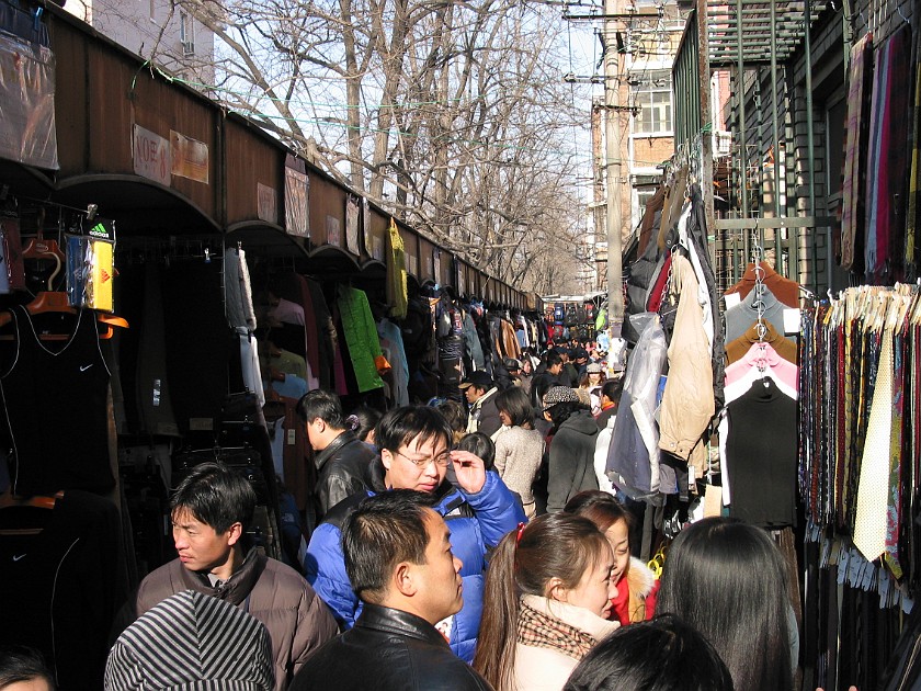 The Streets of Beijing. Xiushui Shichang (Silk Alley) on Jianguomenwai Dajie. Beijing. .