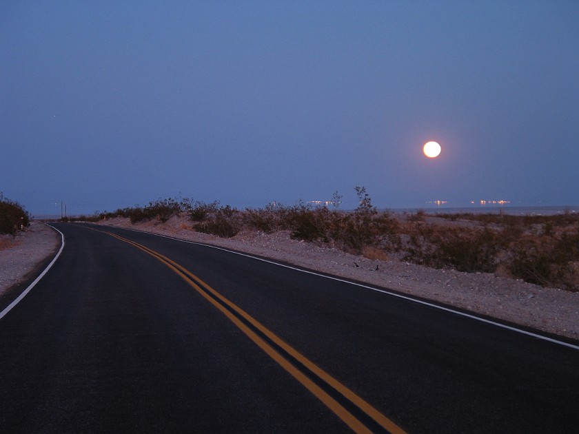 Way from San Diego to the Joshua Tree National Park. Moon Rise on the Road Between Borrego Springs and Salton Sea. near Joshua Tree National Park. .
