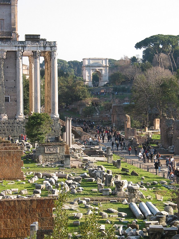 Roman Forum. South-East View on Via Sacra, Tempio di Antonino e Faustia, Arco di Tito. Rome. .