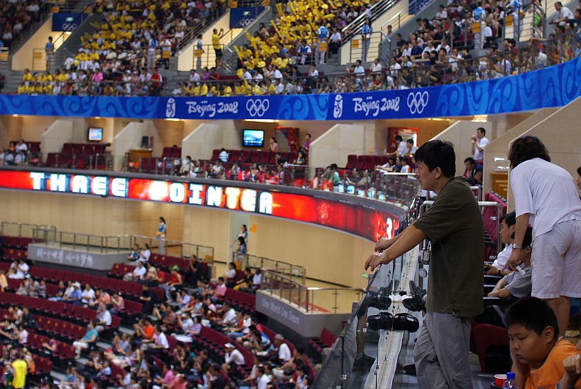 Women's Preliminary Basketball Russia vs White Russia. Friends watching the game from the lounge. Beijing. .