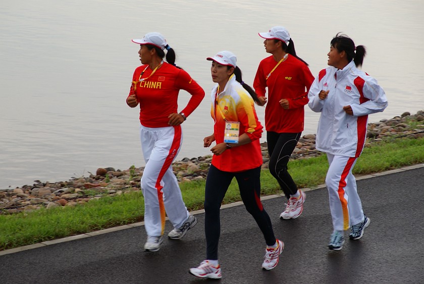 Rowing Finals. Chinese women's quadruple sculls team warming up for the race. Beijing. .