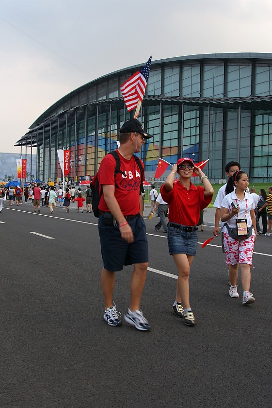 Olympic Green at Daytime. Fans in front of the National Indoor Stadium. Beijing. .