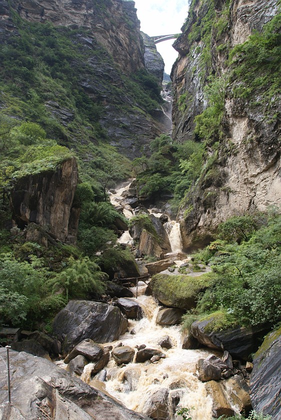 Daytrip to the Tiger Leaping Gorge. Waterfall at the middle rapids. Tiger Leaping Gorge. .