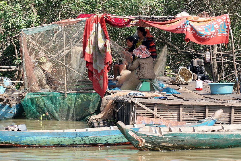 Floating Village of Chong Kneas. Fishermen at Work. Chong Kneas. .