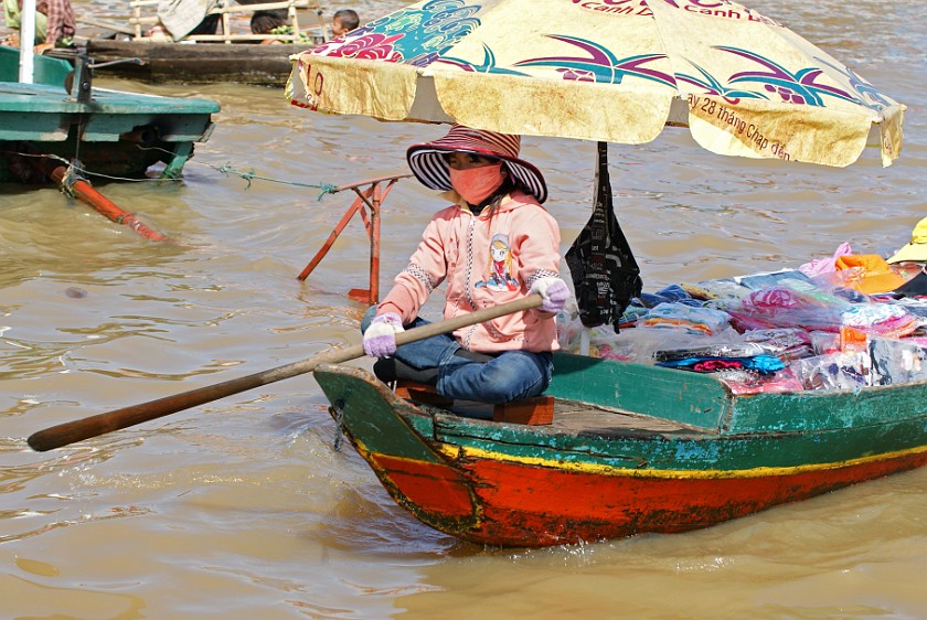 Floating Village of Chong Kneas. Cloth Seller. Chong Kneas. .