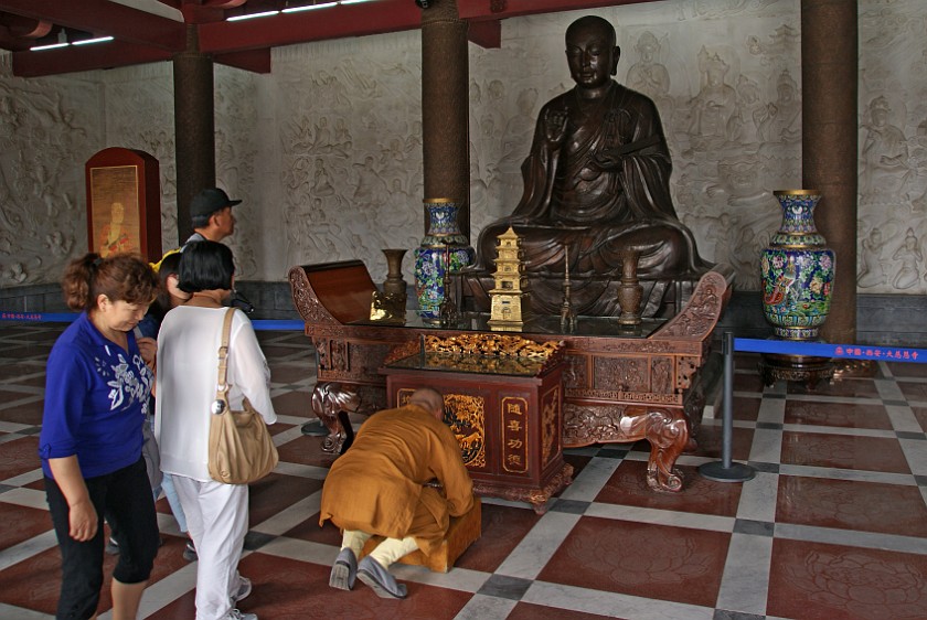 Big Goose Pagoda. Praying Monk Inside the Temple. Xi'an. .