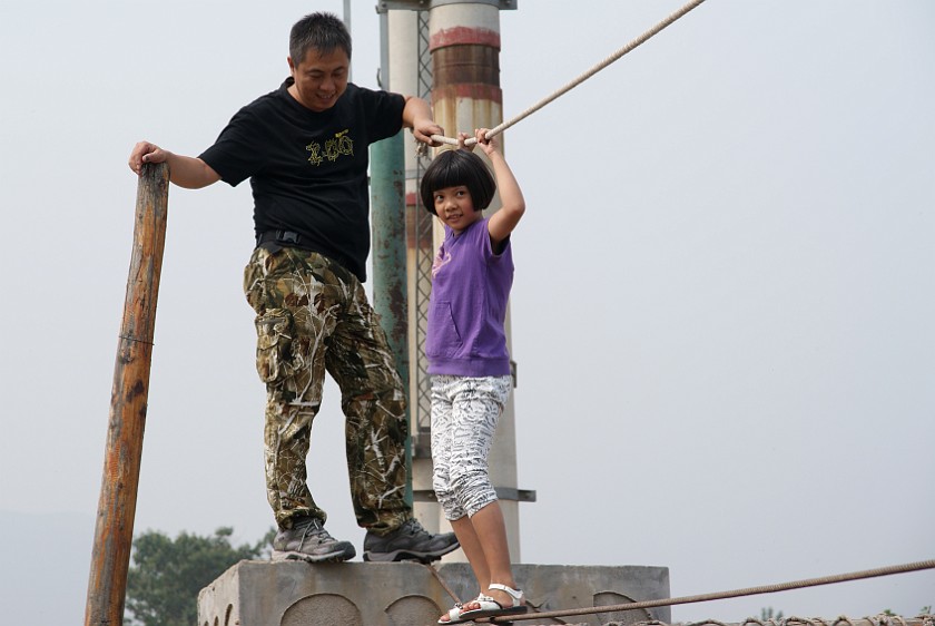 Liquan Yuan Village. Balancing on a Rope. Liquan Yuan. .