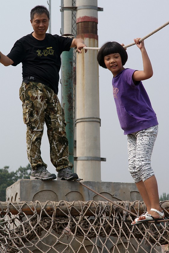 Liquan Yuan Village. Balancing on a Rope. Liquan Yuan. .
