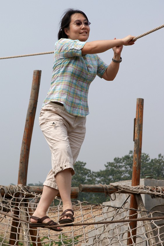 Liquan Yuan Village. Balancing on a Rope. Liquan Yuan. .