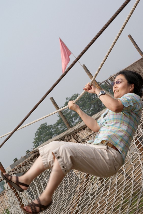 Liquan Yuan Village. Balancing on a Rope. Liquan Yuan. .