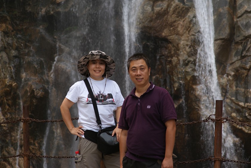 Shanxi Taiping Forest Park. Portrait with Friend in Front of Water Fall. near Xi'an. .