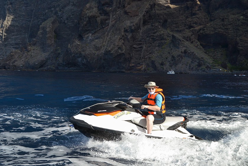 Jet Ski Safari. Jet ski driving in front of the western cliffs of Tenerife. Los Gigantes. .