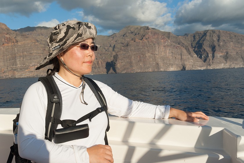 Barranco de Masca. Portrait on the boat with cliffs in the background. Masca. .