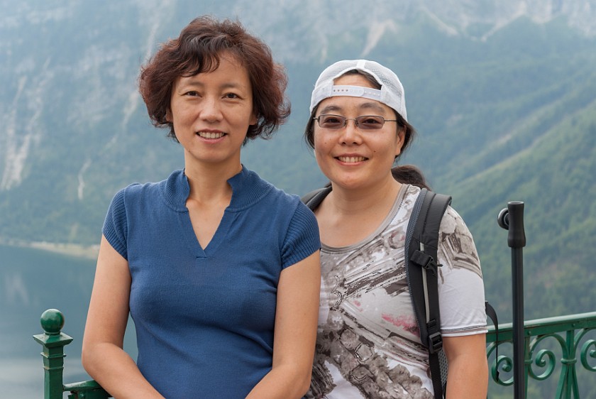 Hallstatt Salt Mine. Portrait with friend in front of Lake Hallstatt. Hallstatt. .