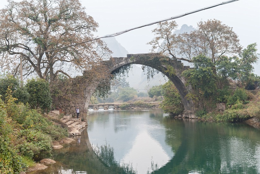 Bicycle Tour Along the Yùlóng Hé River. Fuli bridge. Yángshuò. .