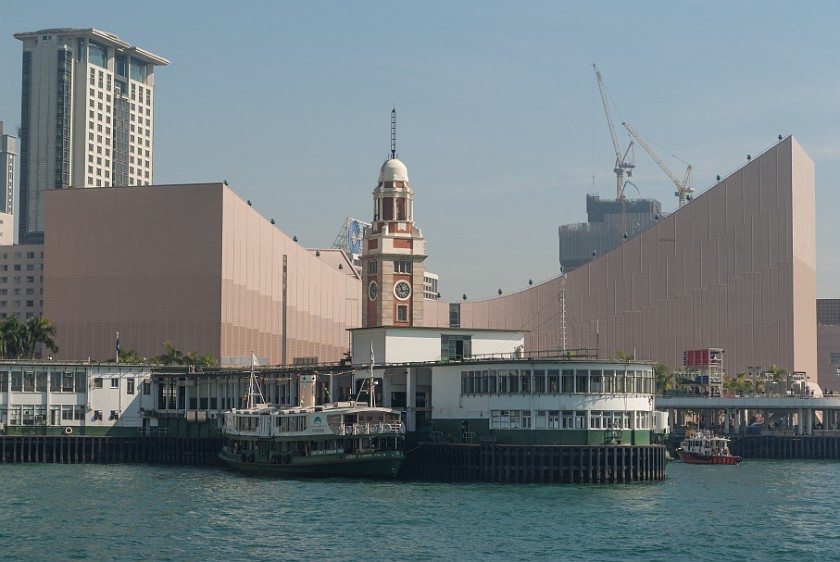 Kowloon. Star Ferry Pier, Clock Tower and Cultural Center. Hong Kong. .