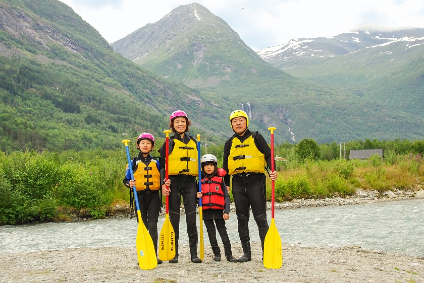 Jostedal Glacier River Rafting. Group portrait in front of the river. Gjerde. .