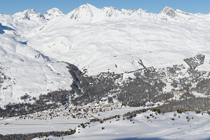 Skiing at the Corvatsch. View on Champfèr and the Suvretta House. Sankt Moritz. .