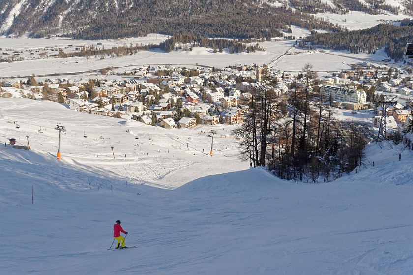 Skiing at the Corviglia. View on Celerina. Sankt Moritz. .
