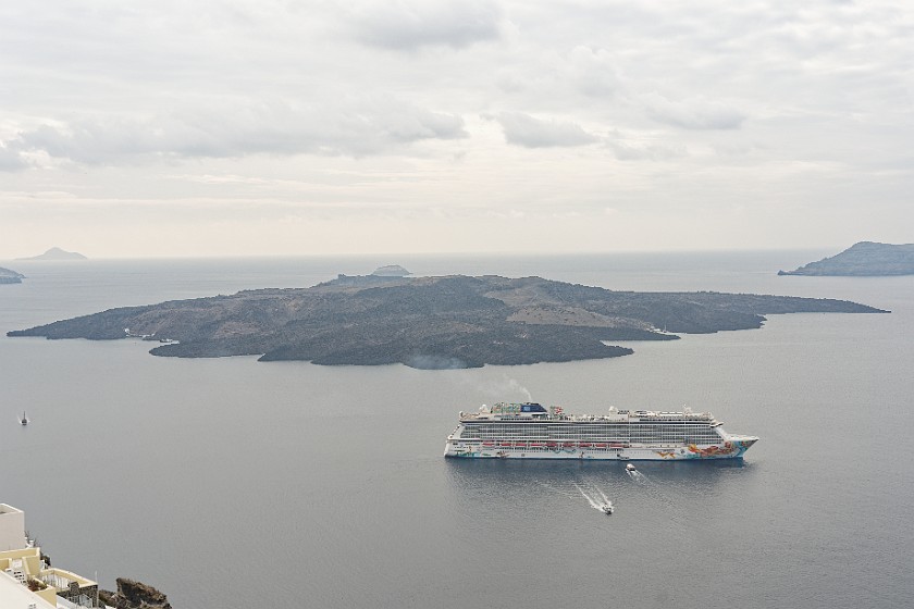 Fira, Santorini. Cruise ship and Nea Kameni island. Fira. .