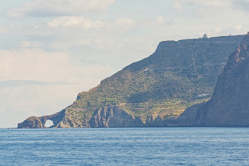 Hiking on Salina. Rock arch at Punta Perciato. Salina. .