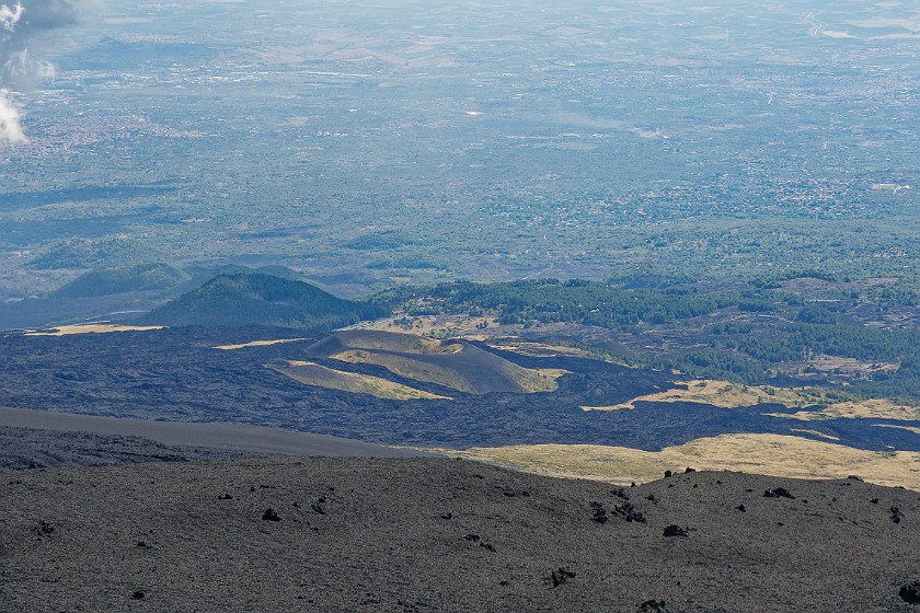 Hiking in the Etna South Area. View on lava fields and craters to the south-west. Nicolosi. .